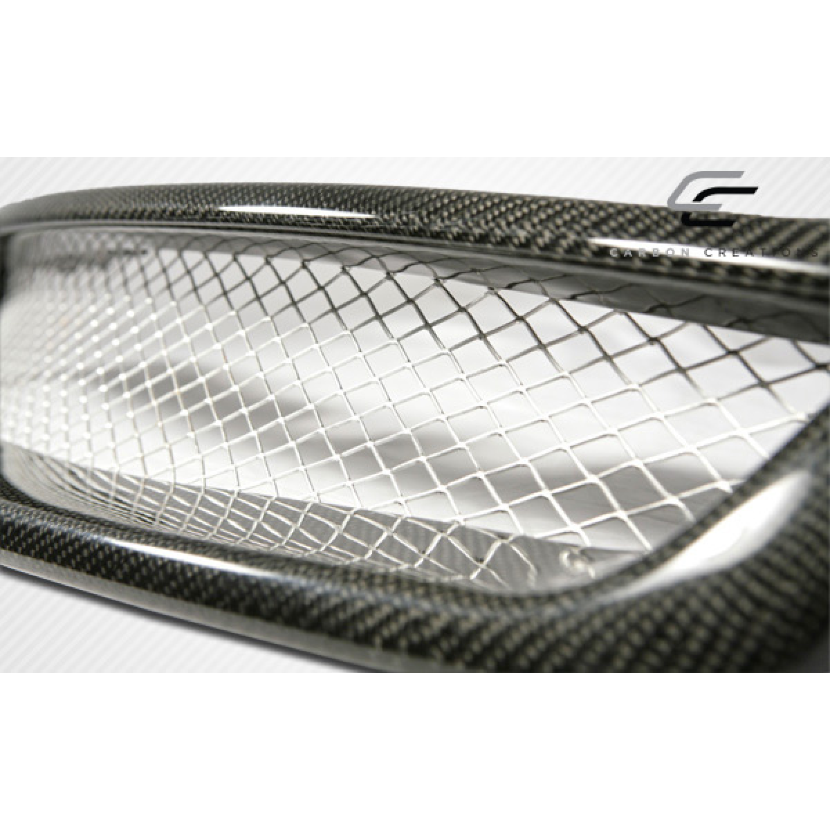 Modify your Infiniti G35 2003 with our Exterior/Grilles - Angled view showcasing the carbon fiber grille