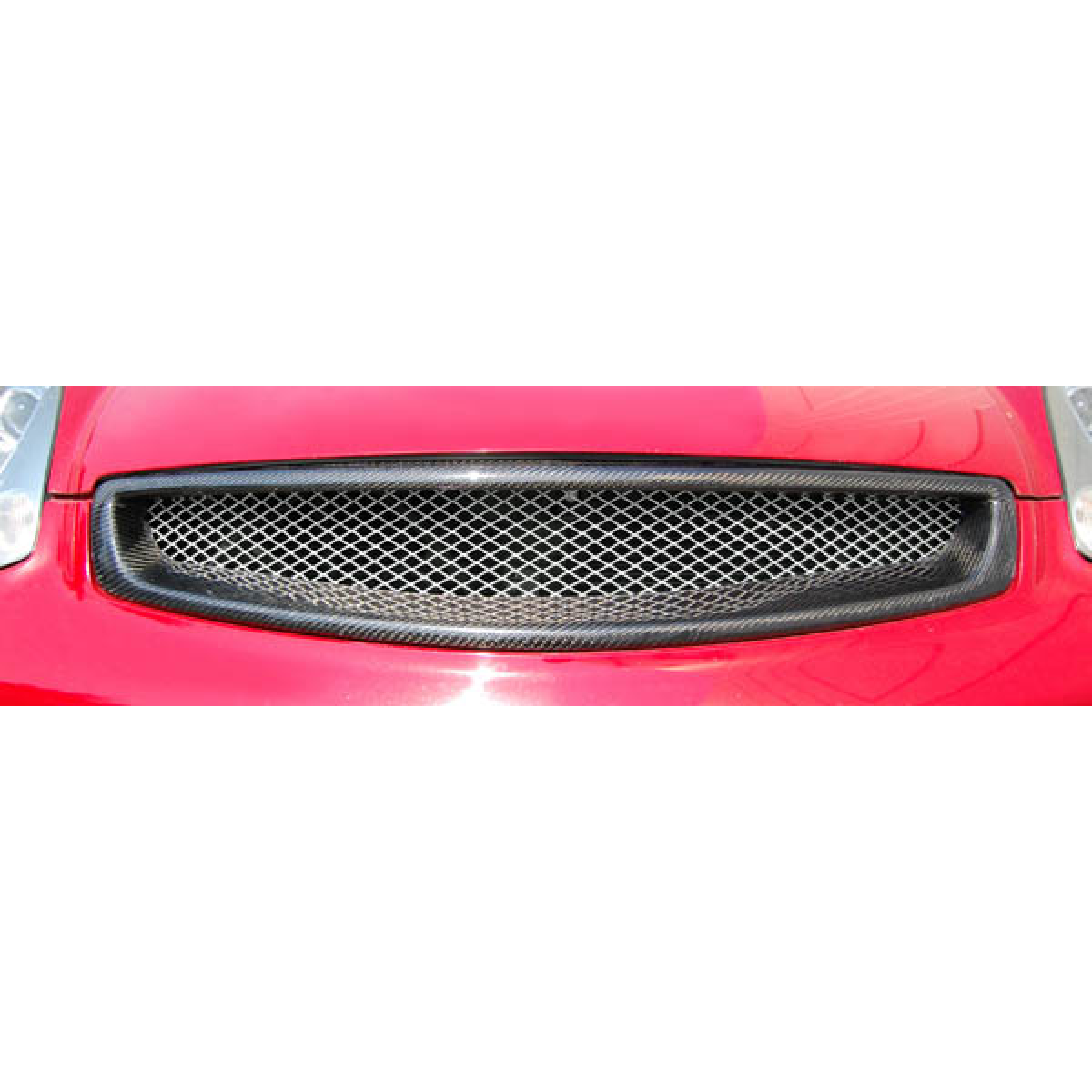 Modify your Infiniti G35 2003 with our Exterior/Grilles - Part viewed from a slight front angle