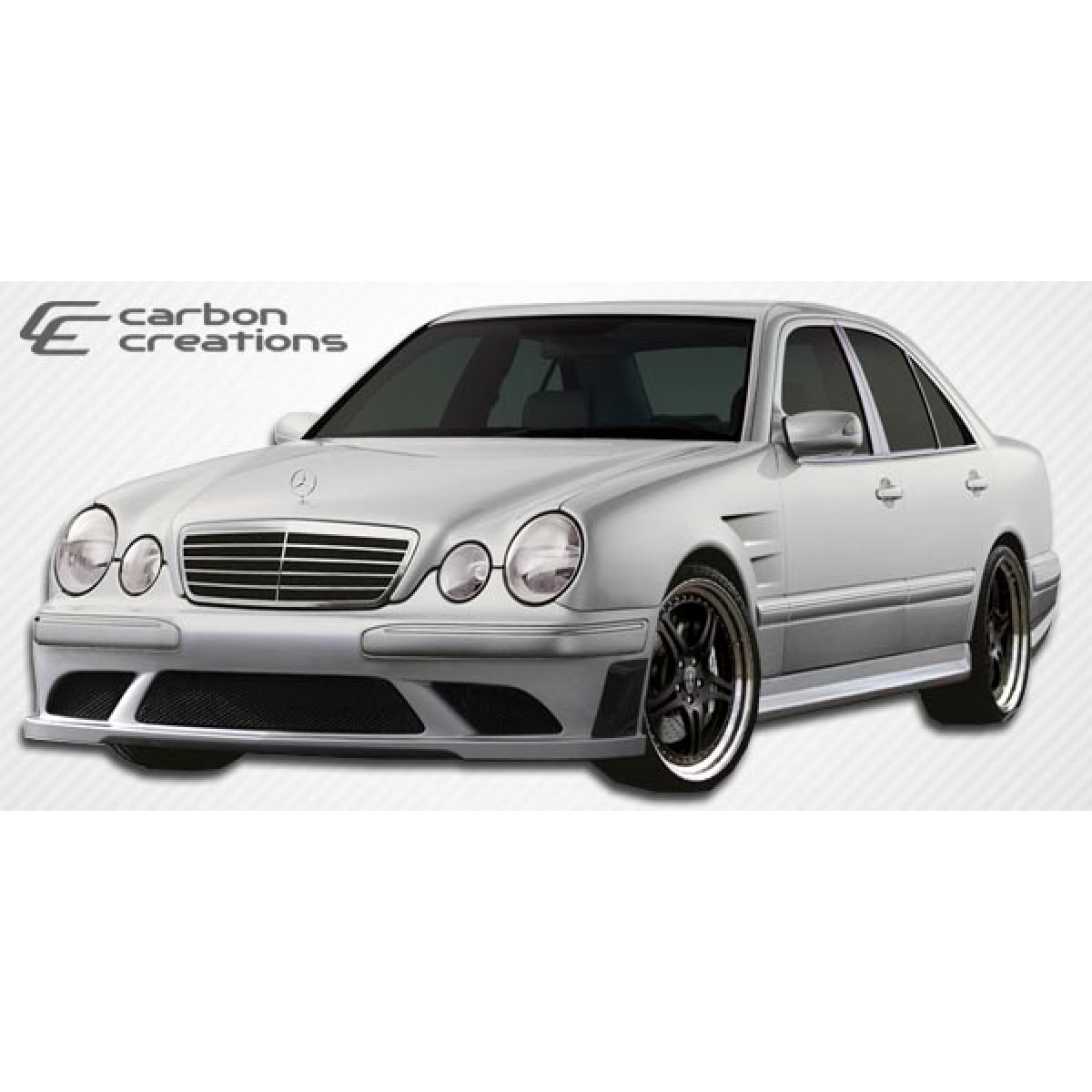 Modify your Mercedes-Benz E-Class 2000 with our Exterior/Front Bumpers or Lips - Front three quarter angle view of the vehicle