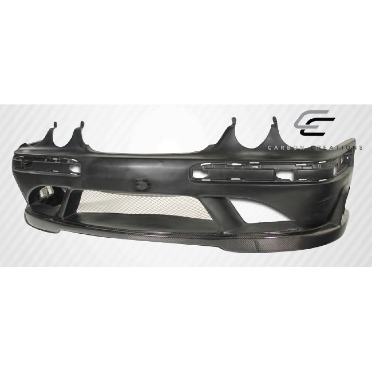 Modify your Mercedes-Benz E-Class 2000 with our Exterior/Front Bumpers or Lips - Front view of front bumper at a slight angle