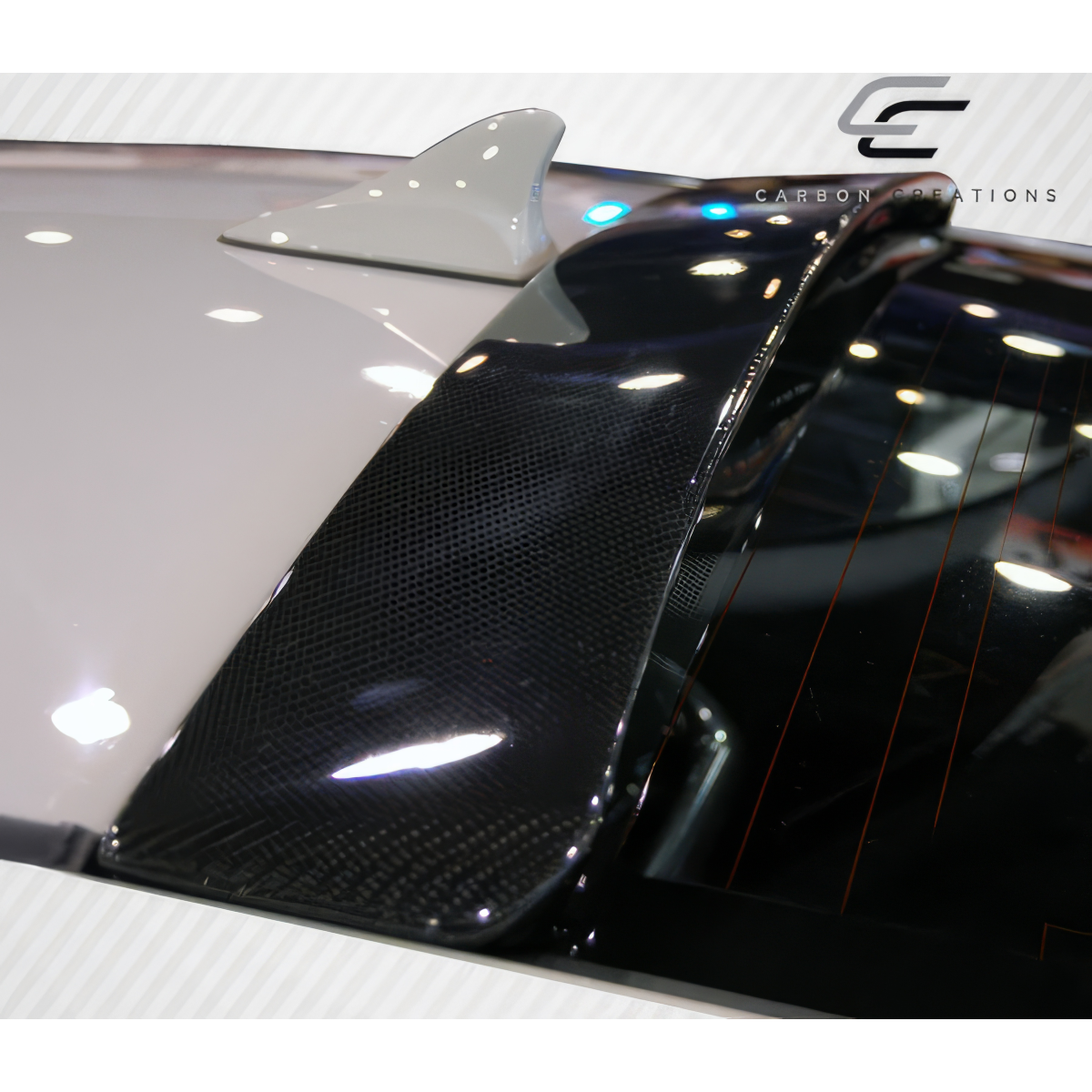 Modify your Hyundai Genesis 2010 with our Exterior/Wings - Top angled view of carbon fiber wing spoiler