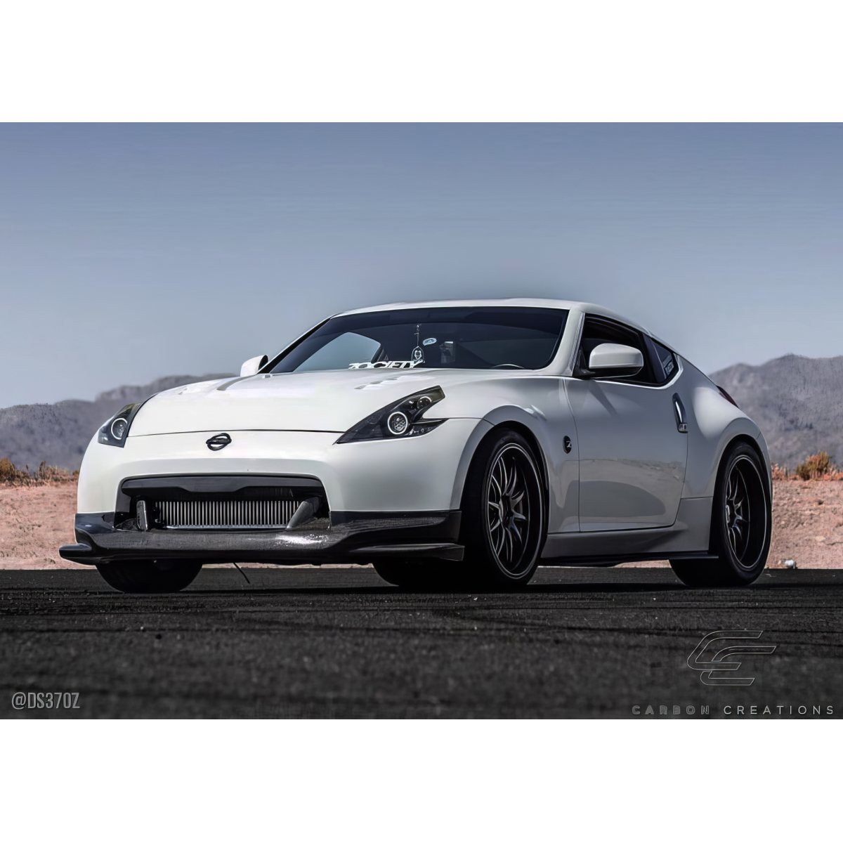 Modify your Nissan 370Z 2009 with our Exterior/Front Bumpers or Lips - Front angle view of the Nissan 370Z car