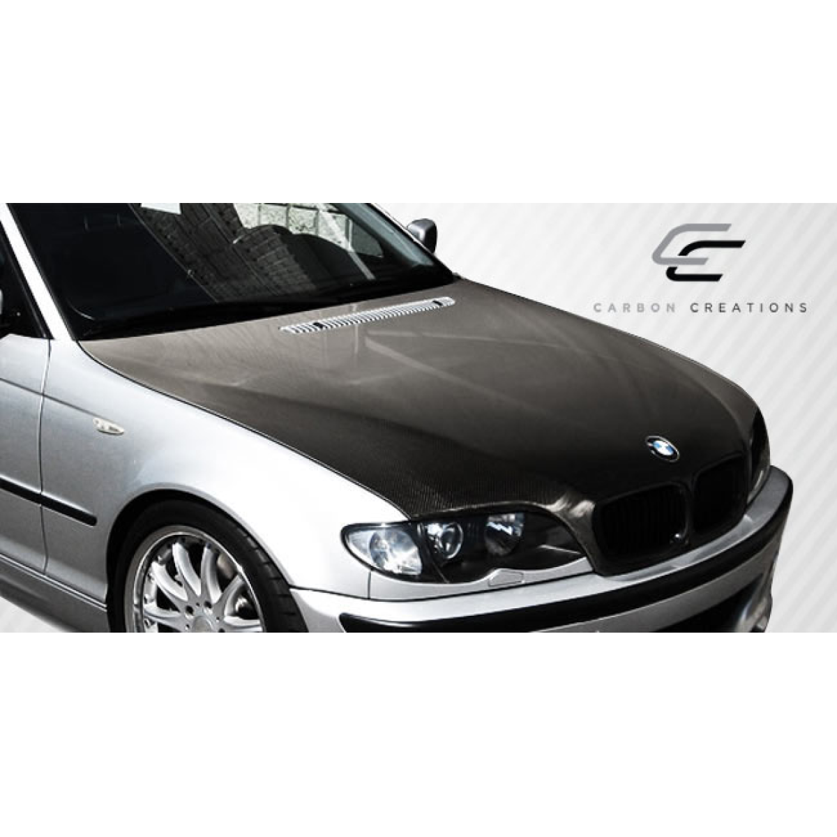 Modify your BMW 3-Series 2002 with our Exterior/Hoods - Viewed from a low front angle focusing on hood