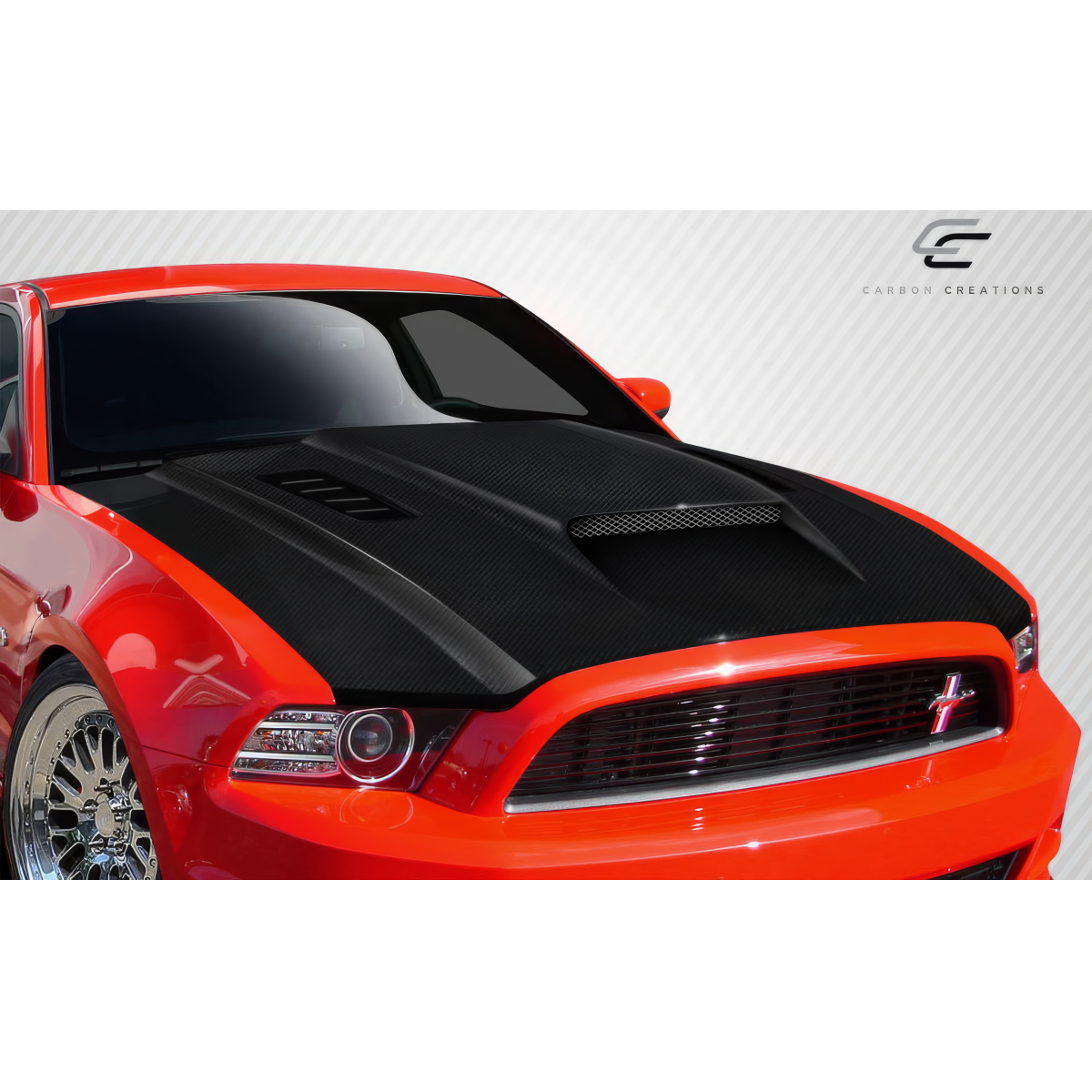 Modify your Ford Mustang 2013 with our Exterior/Hoods - Front angled view of carbon fiber hood