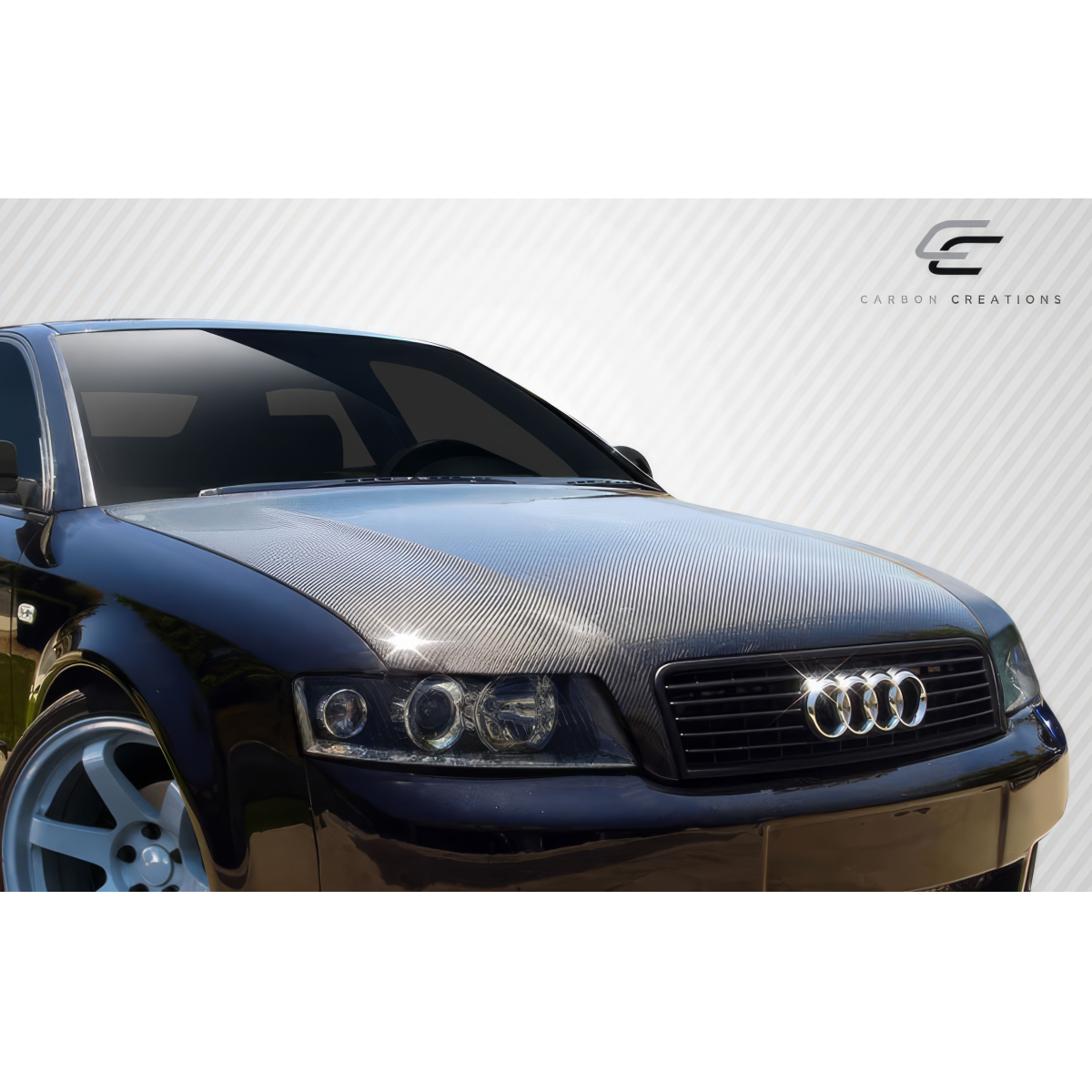 Modify your Audi A4 2002 with our Exterior/Hoods - Front view at a slight angle from the side