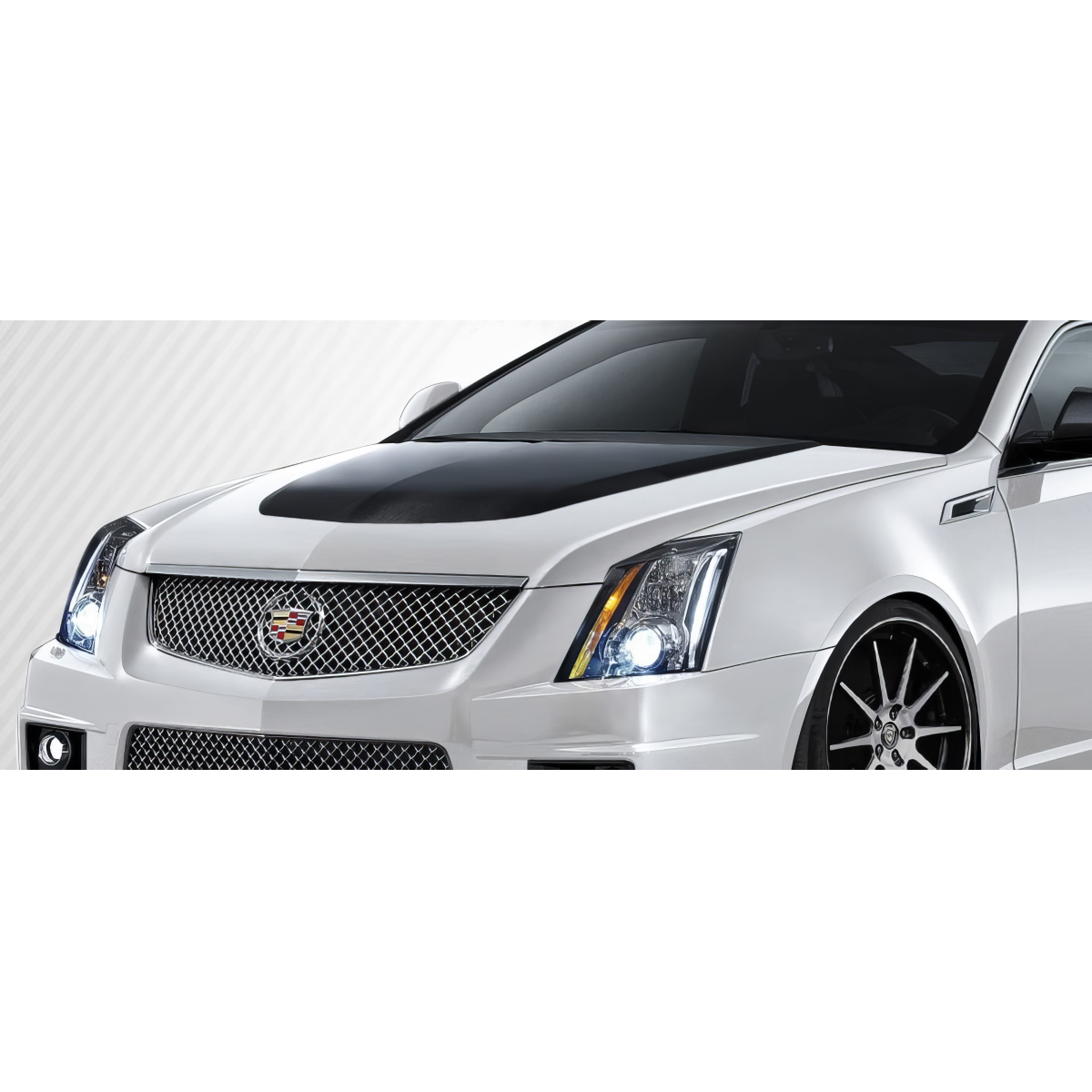 Modify your Cadillac CTS 2009 with our Exterior/Hoods - Front angle view of Cadillac CTS V carbon hood