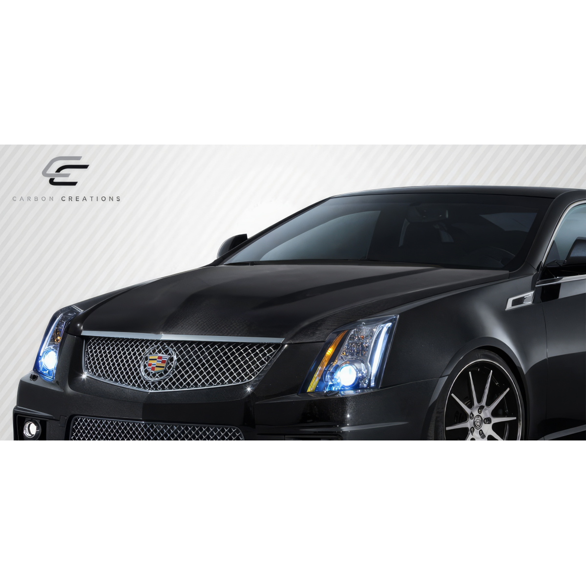 Modify your Cadillac CTS 2009 with our Exterior/Hoods - Front view of vehicle at a slight angle