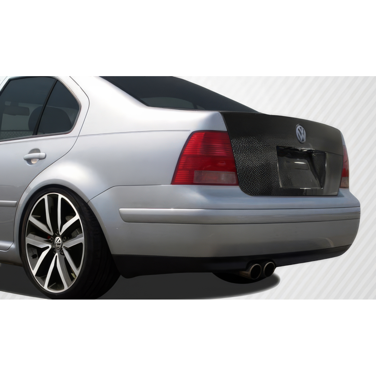 Modify your Volkswagen Jetta 1999 with our Exterior/Trunks - View is from the rear at a slight angle