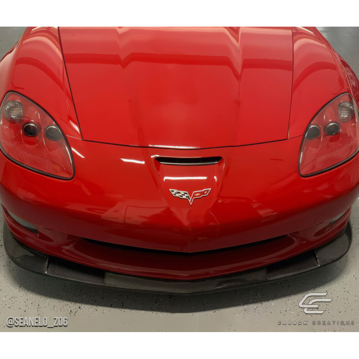 Modify your Chevrolet Corvette 2005 with our Exterior/Front Bumpers or Lips - Front view of car showcasing carbon fiber lip