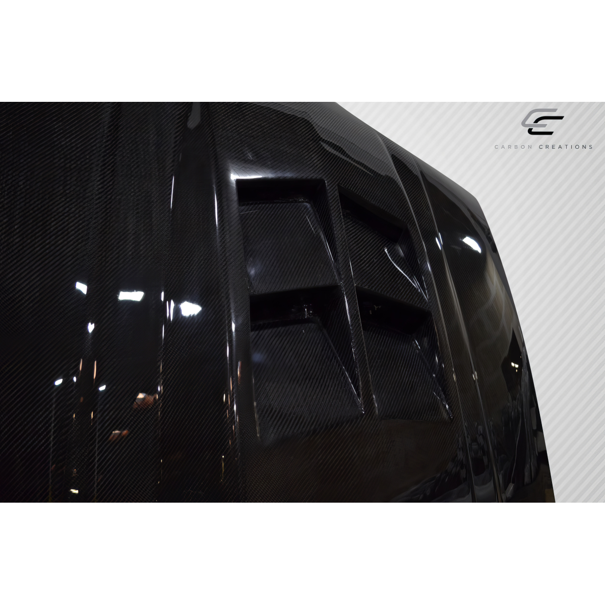 Modify your Chevrolet Camaro 1982 with our Exterior/Hoods - Angled view of carbon fiber hood part