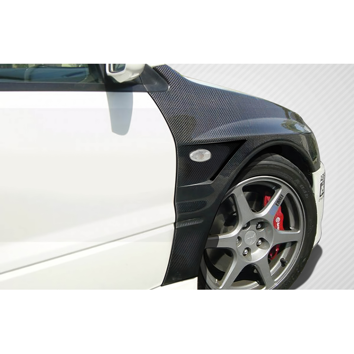 Modify your Mitsubishi Evolution 2003 with our Exterior/Fenders - Front left angle showcasing carbon fiber fender