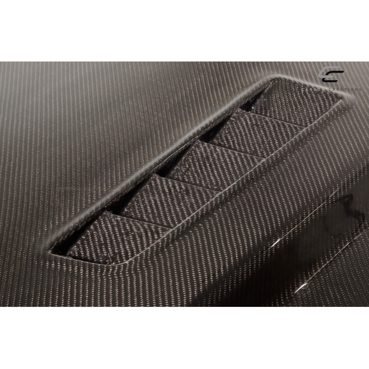 Modify your Ford Mustang 2013 with our Exterior/Hoods - Angle shows close up view of carbon fiber texture