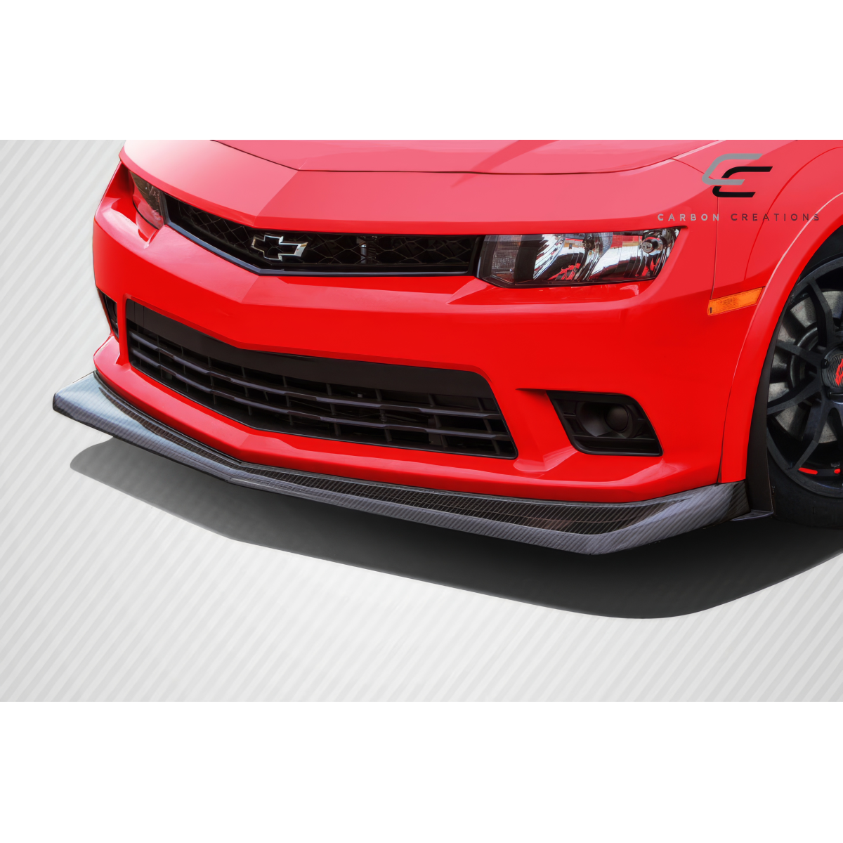 Modify your Chevrolet Camaro 2014 with our Exterior/Front Bumpers or Lips - Front angle showcasing carbon fiber lip