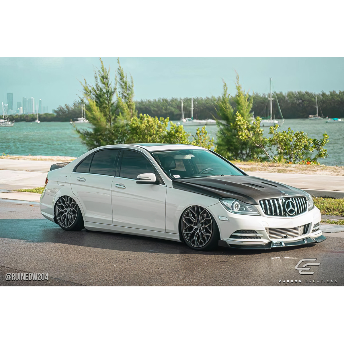 Modify your Mercedes-Benz C300 2008 with our Exterior/Hoods - Side angle view of the lowered Mercedes C300