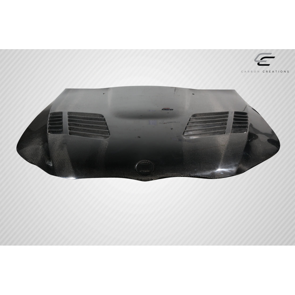 Modify your BMW 5-Series 2004 with our Exterior/Hoods - Top down view of a carbon fiber hood