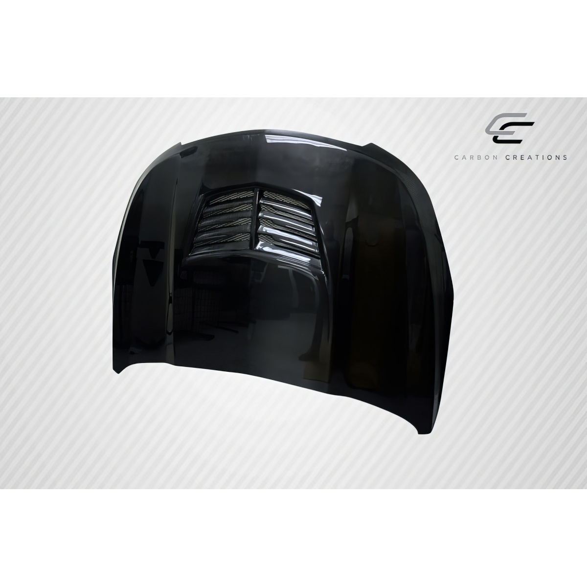 Modify your Chevrolet Cruze 2011 with our Exterior/Hoods - Angle view showing the carbon fiber hood design