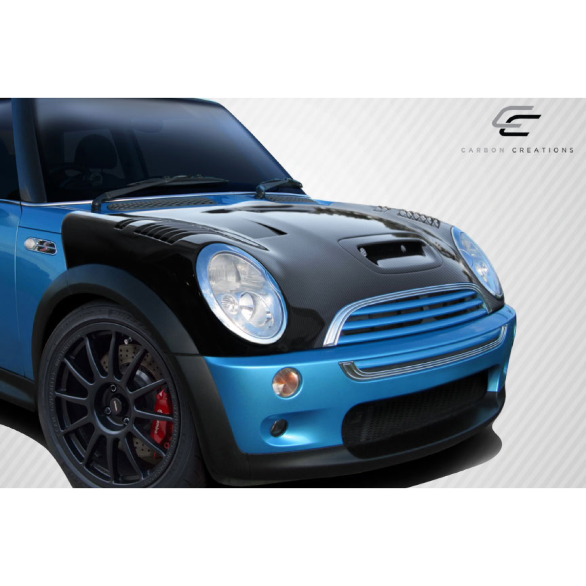 Modify your Mini Cooper 2002 with our Exterior/Hoods - Image viewed from a front angle