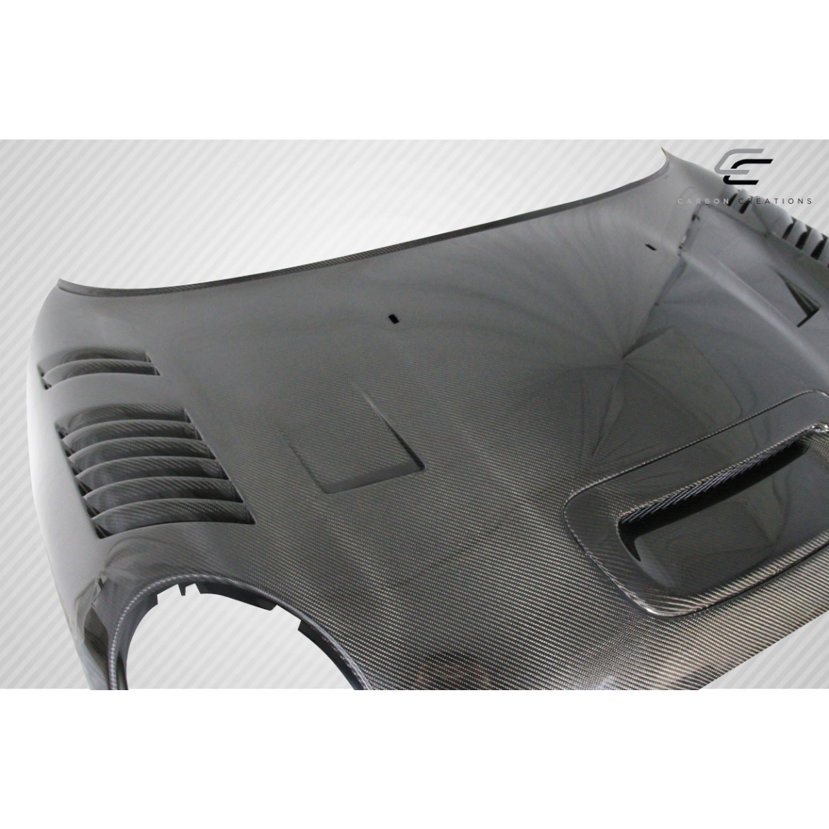 Modify your Mini Cooper 2007 with our Exterior/Hoods - View from a slight upward angle