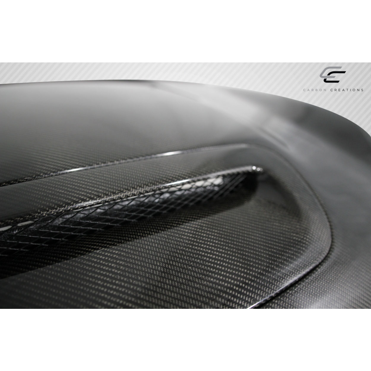 Modify your Mini Cooper 2007 with our Exterior/Hoods - Part viewed from a slight overhead angle