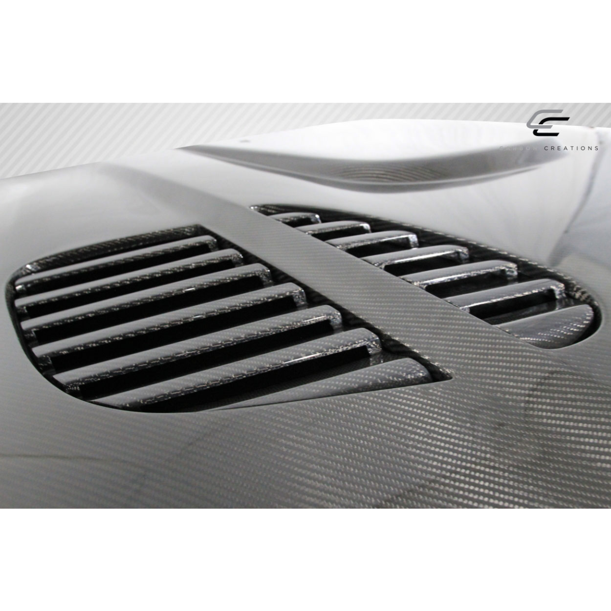 Modify your BMW 3-Series 1992 with our Exterior/Hoods - Top angled view of carbon fiber hood design