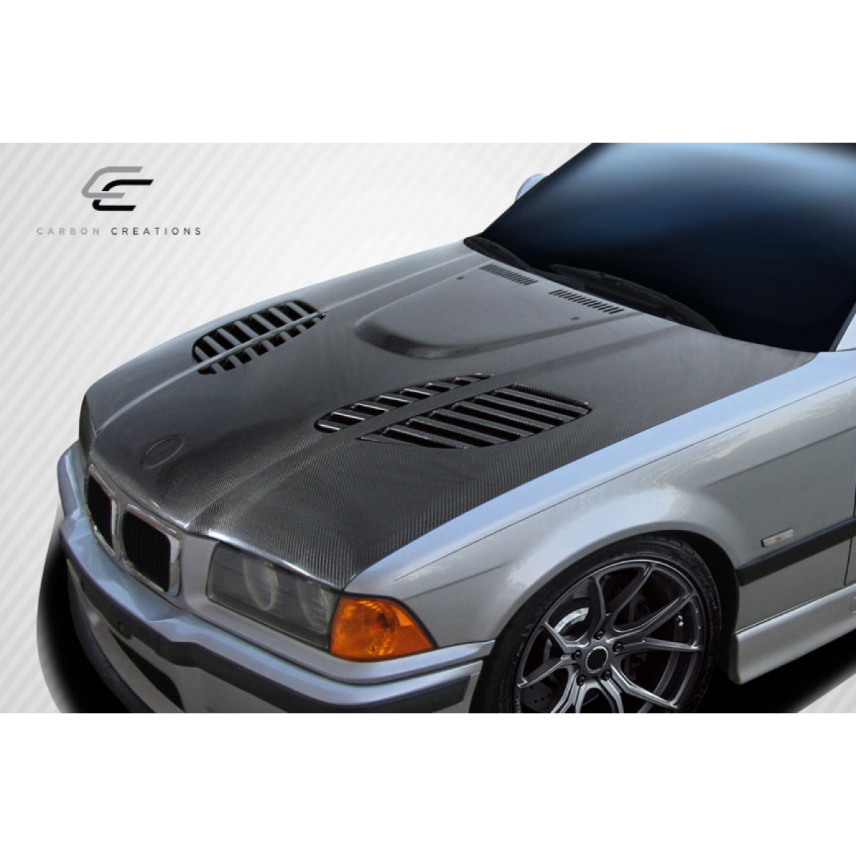 Modify your BMW 3-Series 1992 with our Exterior/Hoods - Top down angle highlighting carbon fiber hood