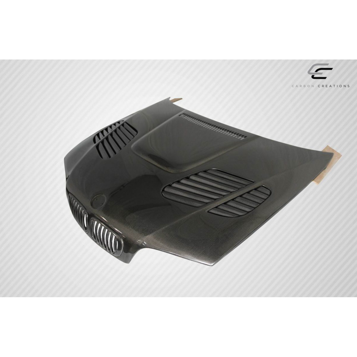 Modify your BMW 3-Series 1999 with our Exterior/Hoods - Part is shown from above at a slight angle