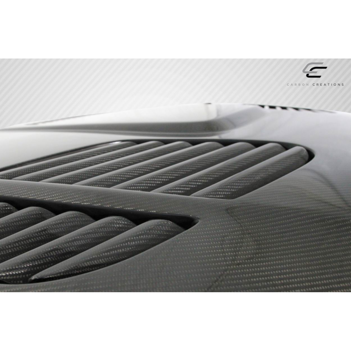 Modify your BMW 3-Series 1999 with our Exterior/Hoods - Top angled view of carbon fiber hood