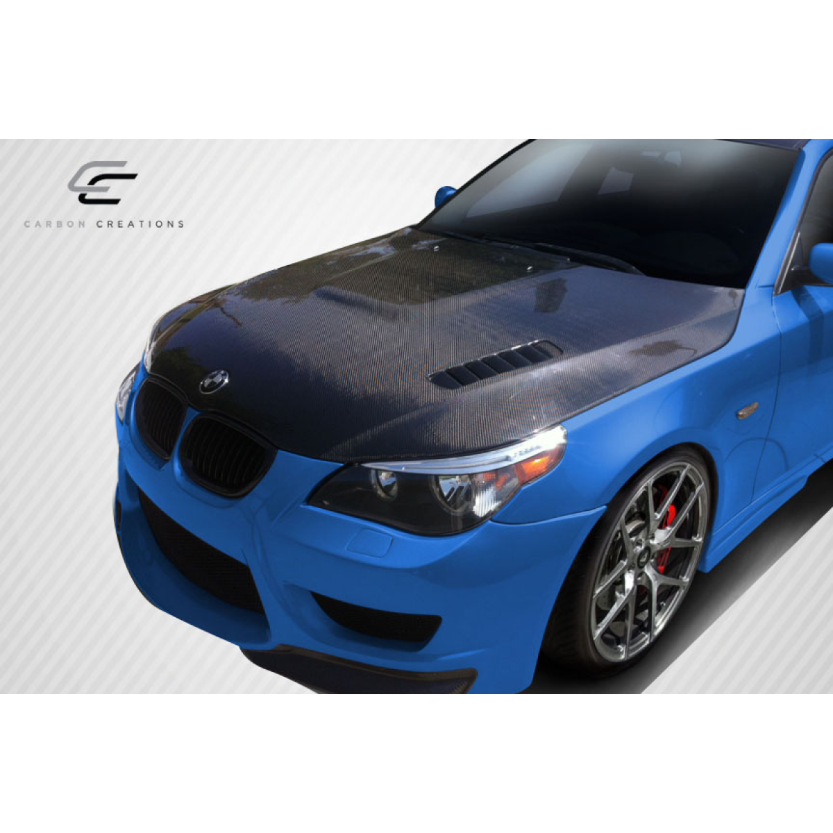 Modify your BMW 5-Series 2004 with our Exterior/Hoods - Front three quarter angle view of the vehicle