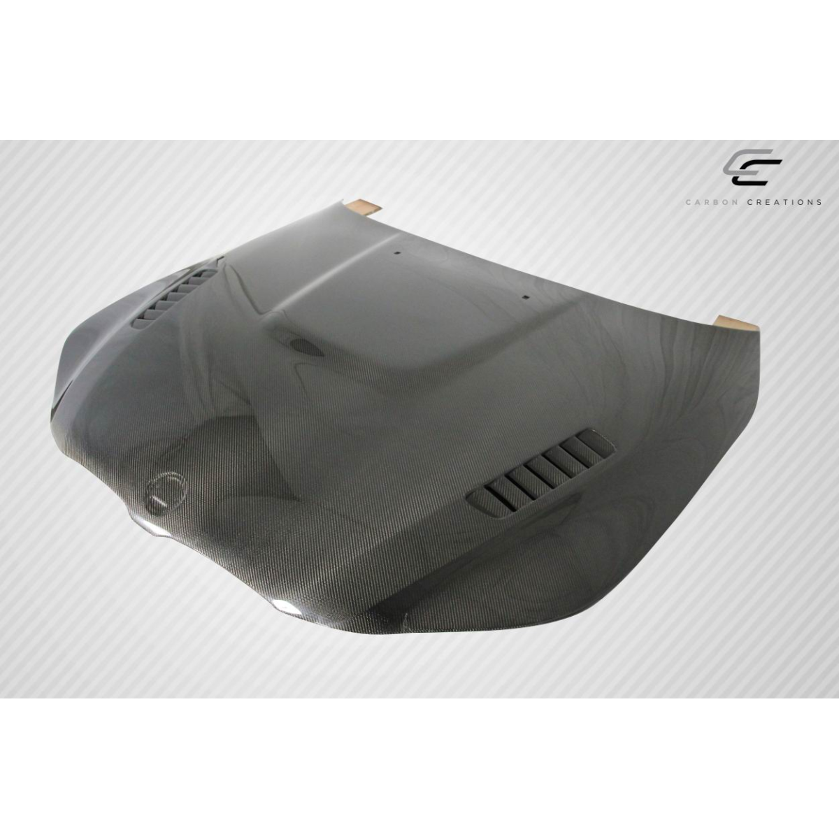 Modify your BMW 5-Series 2004 with our Exterior/Hoods - Viewed from above at a slight angle