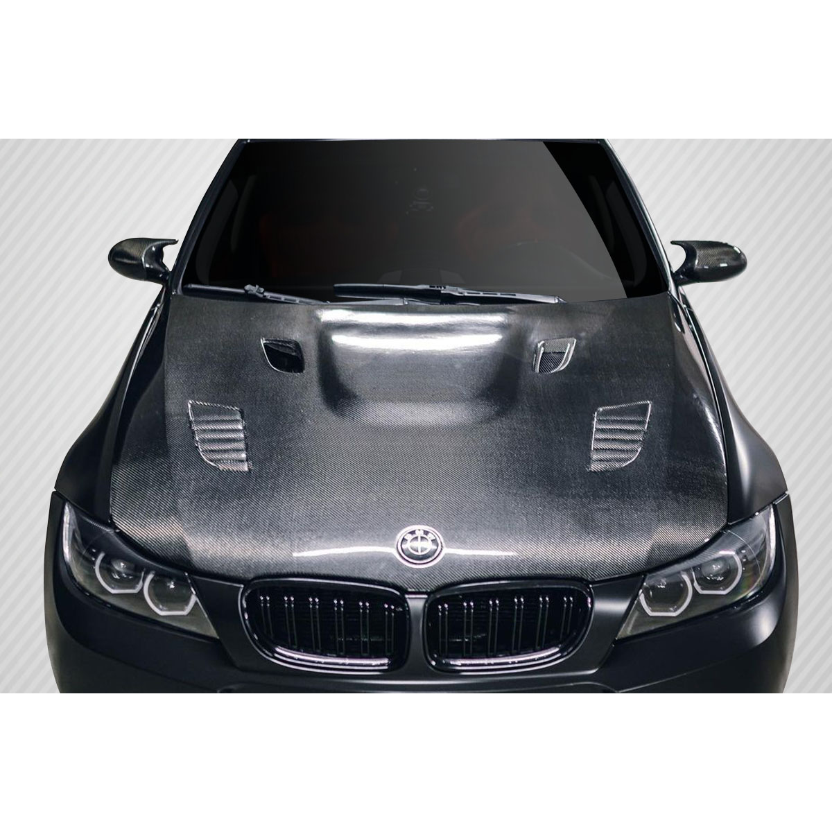 Modify your BMW 3-Series 2009 with our Exterior/Hoods - Front view of carbon fiber hood at a straight angle