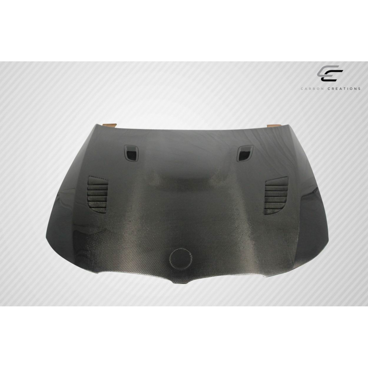 Modify your BMW 3-Series 2009 with our Exterior/Hoods - Front view of carbon fiber hood from above