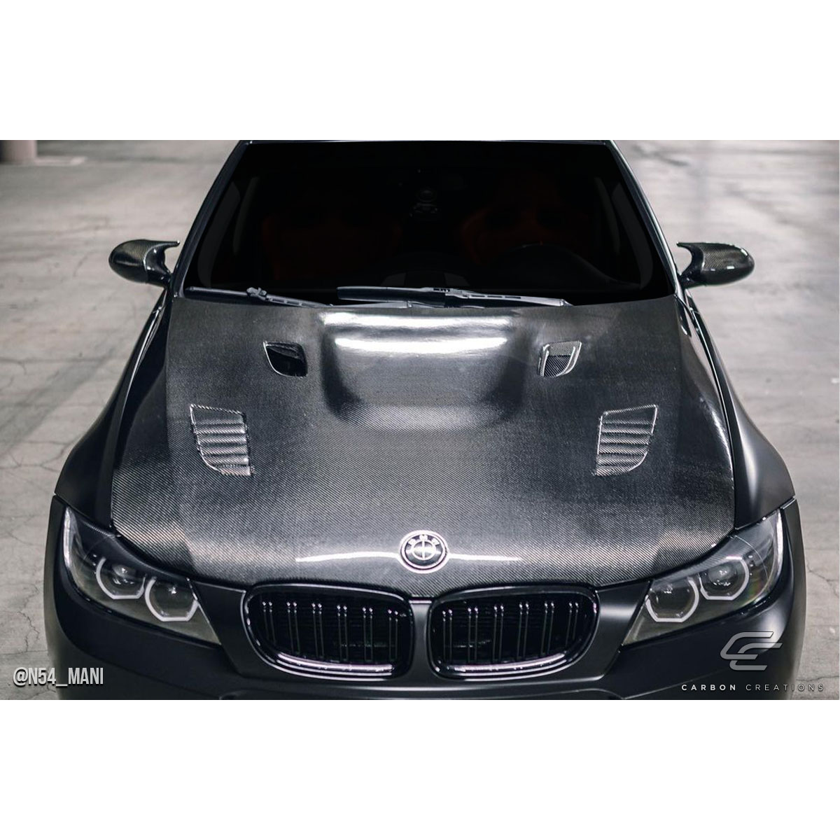 Modify your BMW 3-Series 2009 with our Exterior/Hoods - Viewed from the front at a slight angle