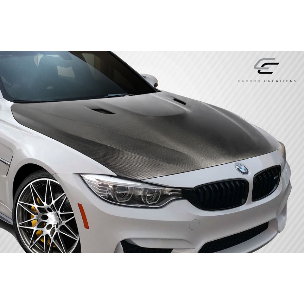 Modify your BMW M3 2014 with our Exterior/Hoods - Front angle showcasing carbon fiber hood design