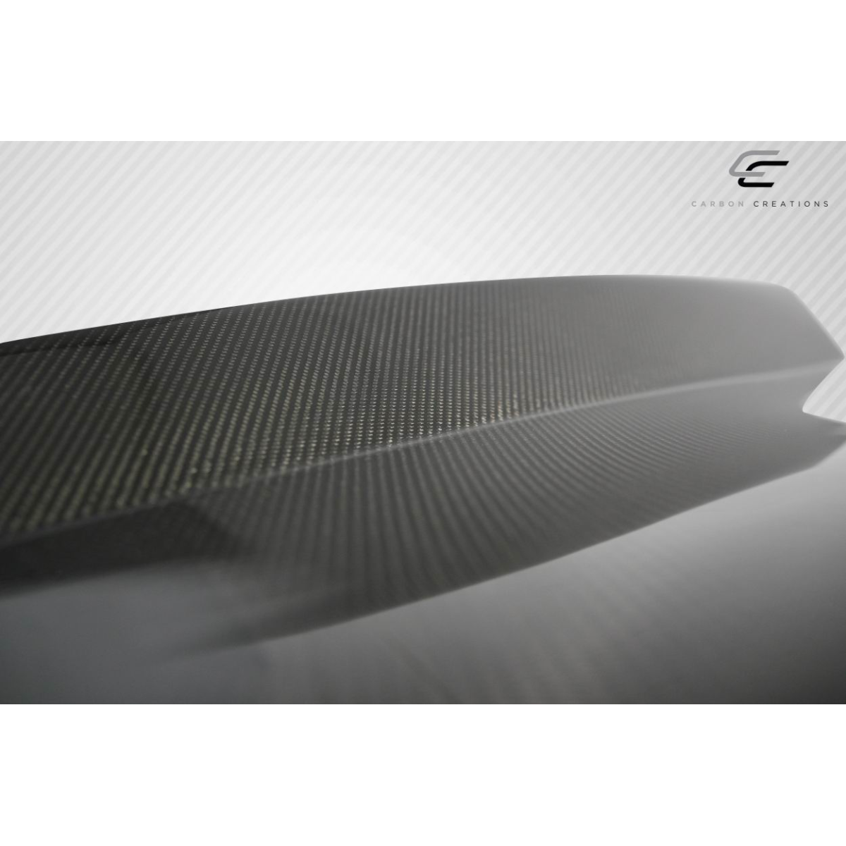 Modify your Chevrolet Corvette 1997 with our Exterior/Hoods - Angled view of carbon fiber hood part