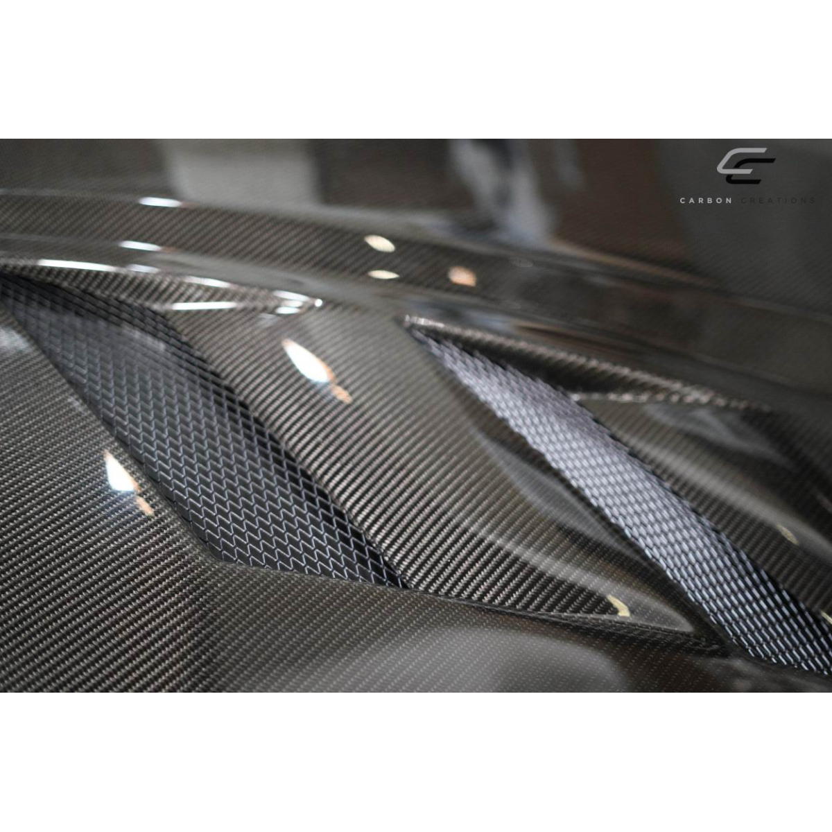 Modify your Chevrolet Camaro 2010 with our Exterior/Hoods - Part shown at a slight downward angle