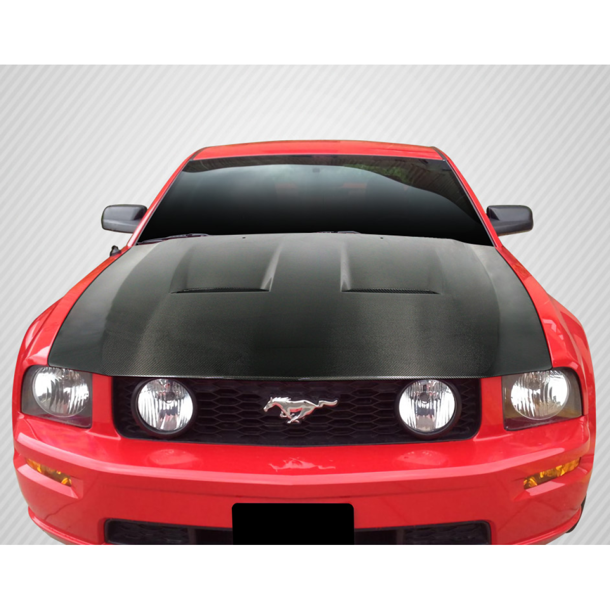 Modify your Ford Mustang 2005 with our Exterior/Hoods - Front view of carbon fiber hood on red Mustang