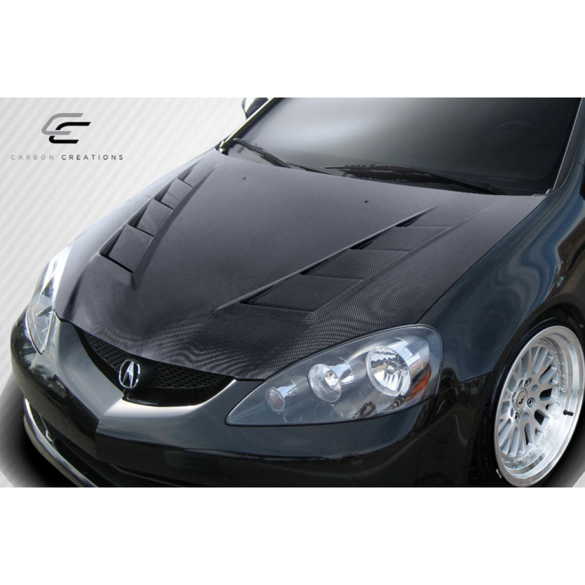 Modify your Acura RSX 2002 with our Exterior/Hoods - Front angle of the car hood showing carbon fiber design