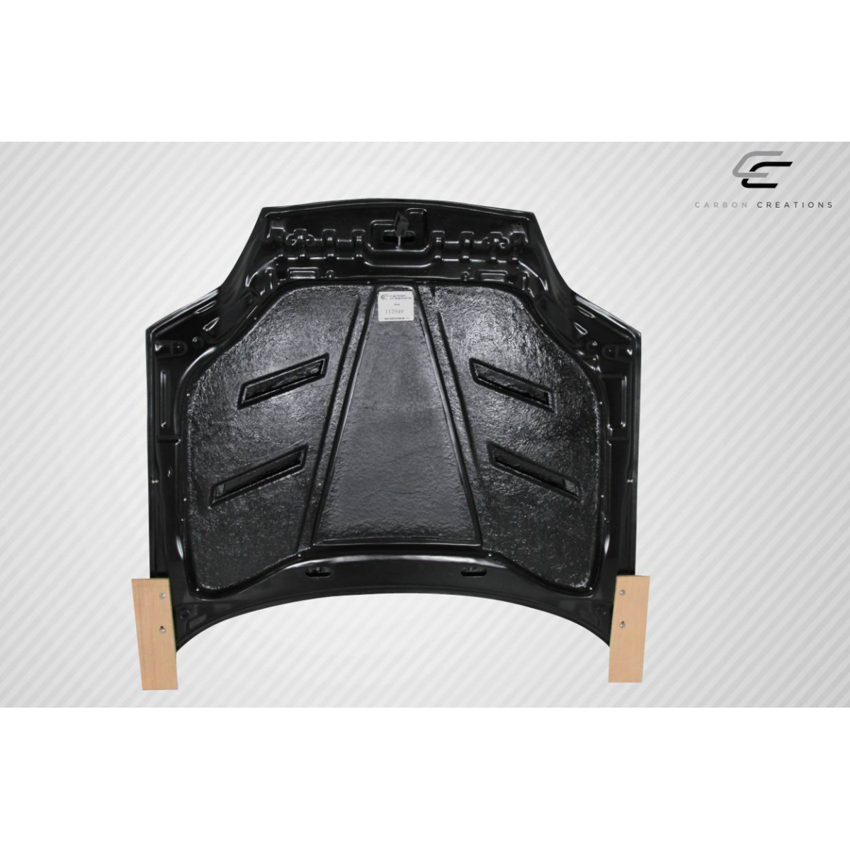 Modify your Hyundai Tiburon 2003 with our Exterior/Hoods - The part is shown from a top-down angle