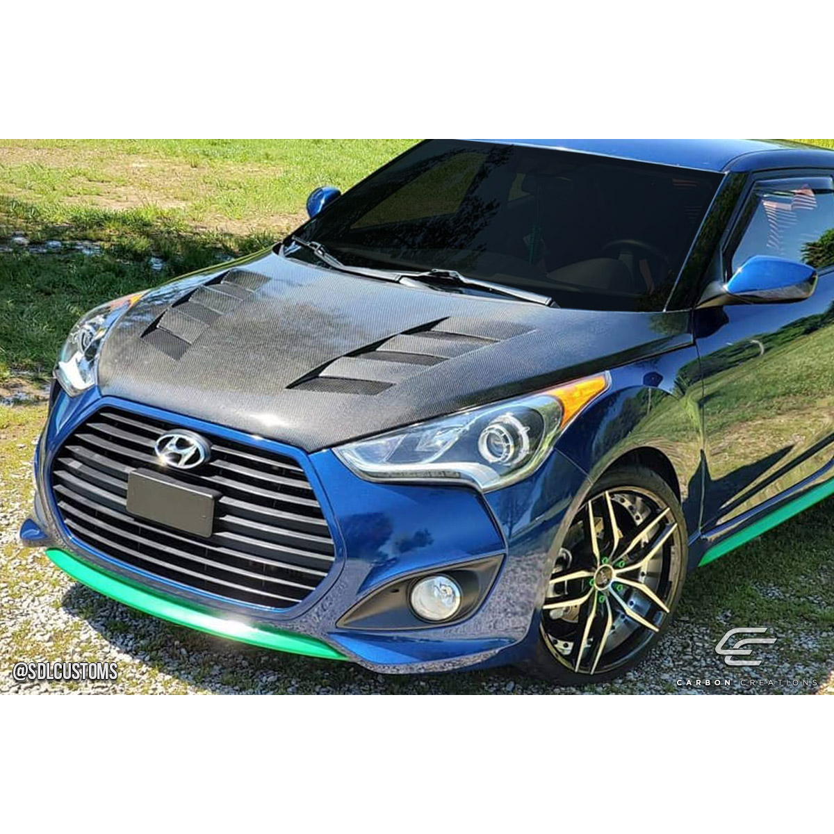 Modify your Hyundai Veloster 2012 with our Exterior/Hoods - View from the front and slightly above