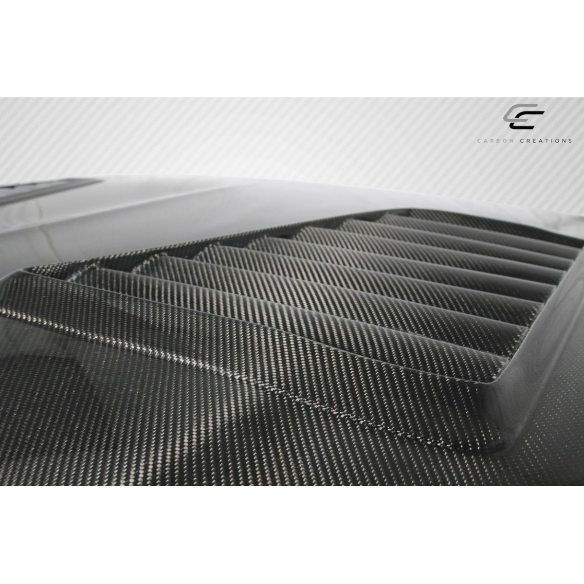 Modify your Mitsubishi Evolution 2003 with our Exterior/Hoods - Viewed from a slightly elevated angle