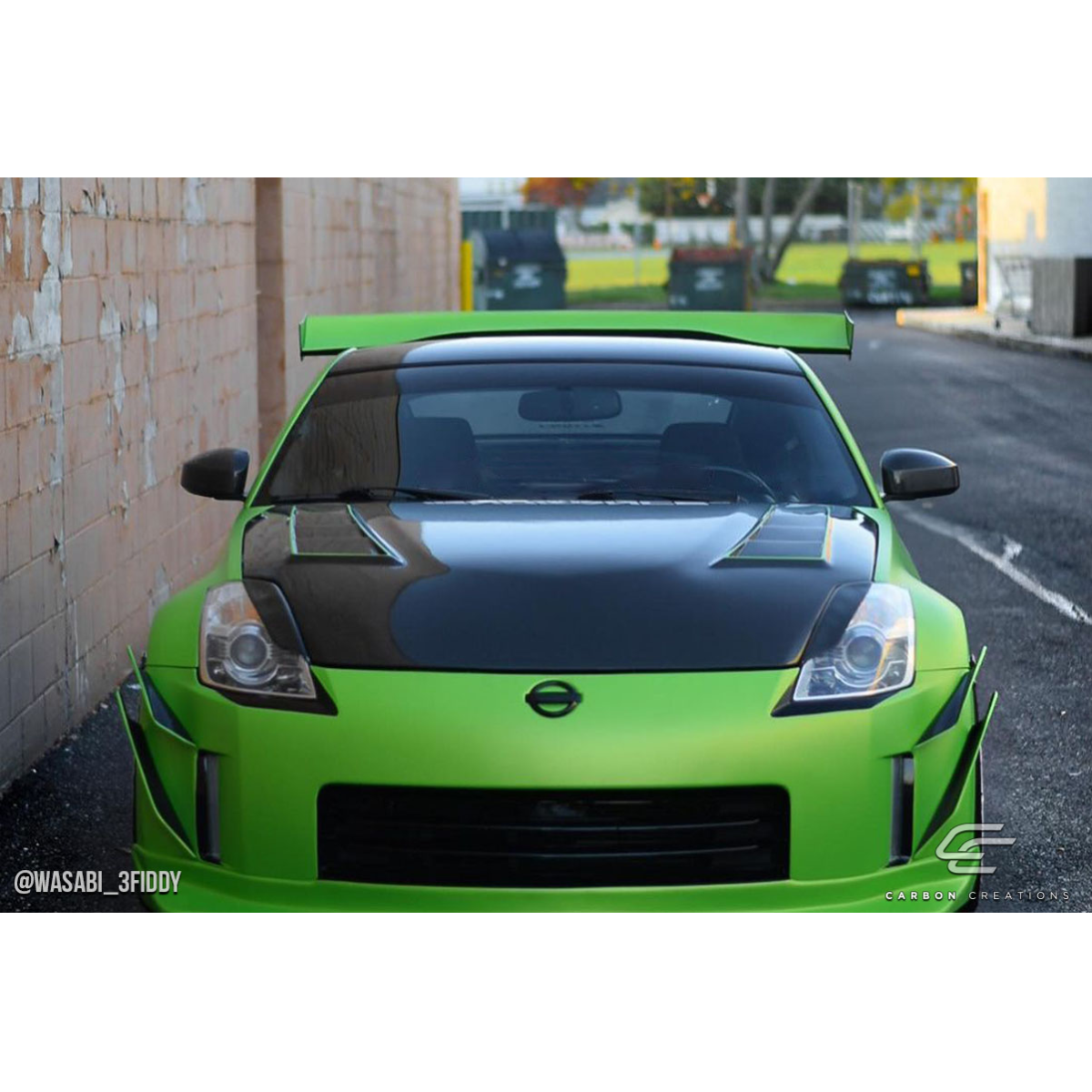 Modify your Nissan 350Z 2003 with our Exterior/Hoods - Front angle view of the Nissan 350Z car