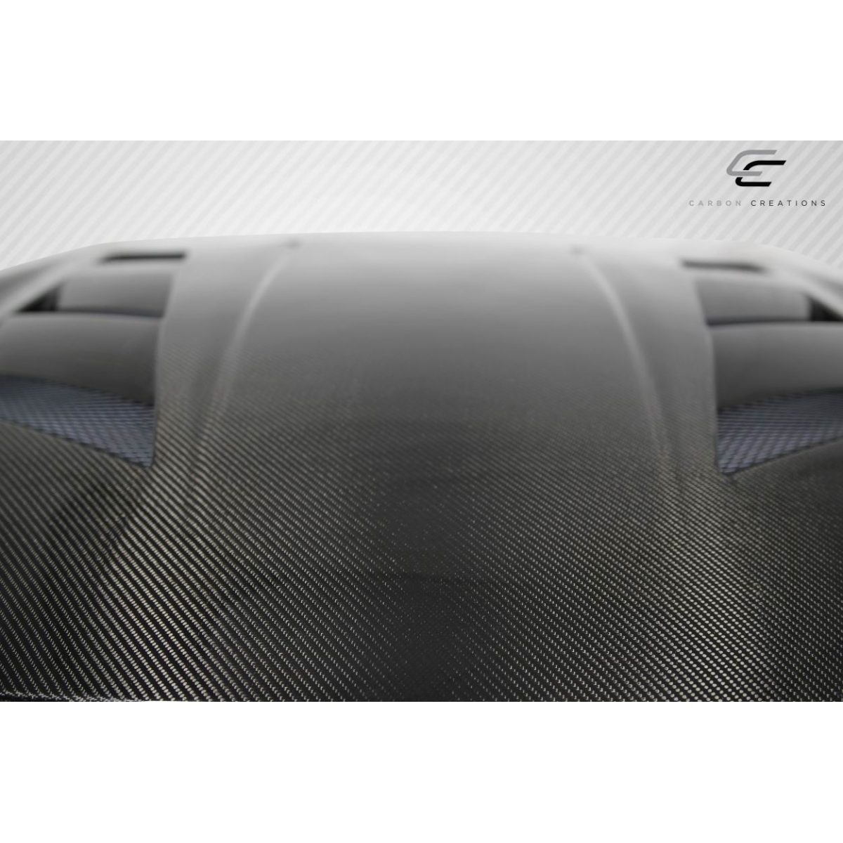 Modify your Infiniti G35 2003 with our Exterior/Hoods - Top down angle showing carbon fiber hood texture