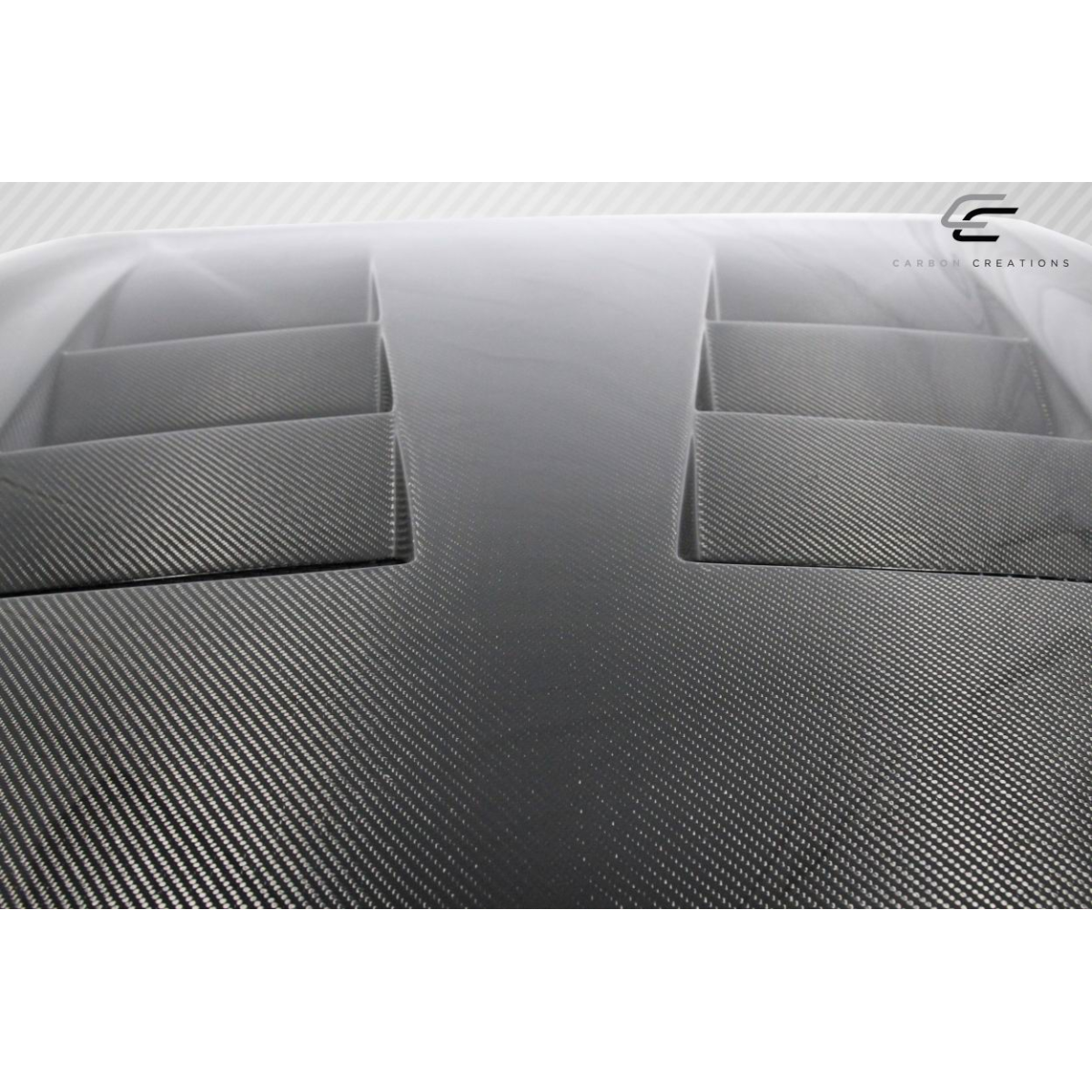 Modify your Infiniti G35 2007 with our Exterior/Hoods - Top down angle of a carbon fiber hood