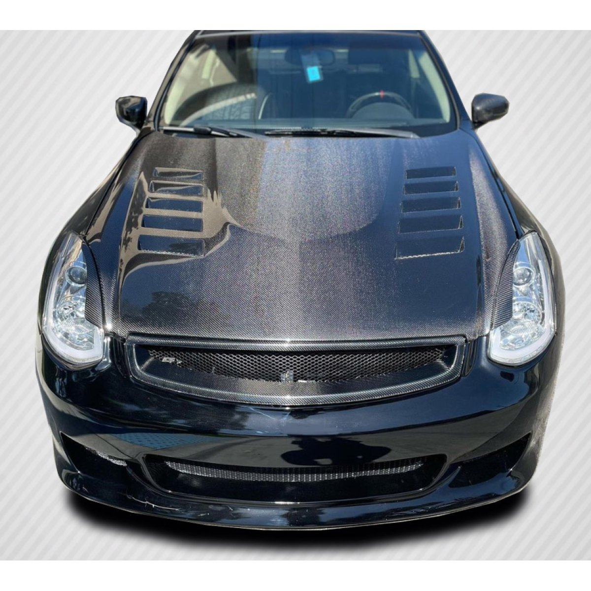 Modify your Infiniti G35 2003 with our Exterior/Hoods - Front view of the carbon fiber hood at zero degrees