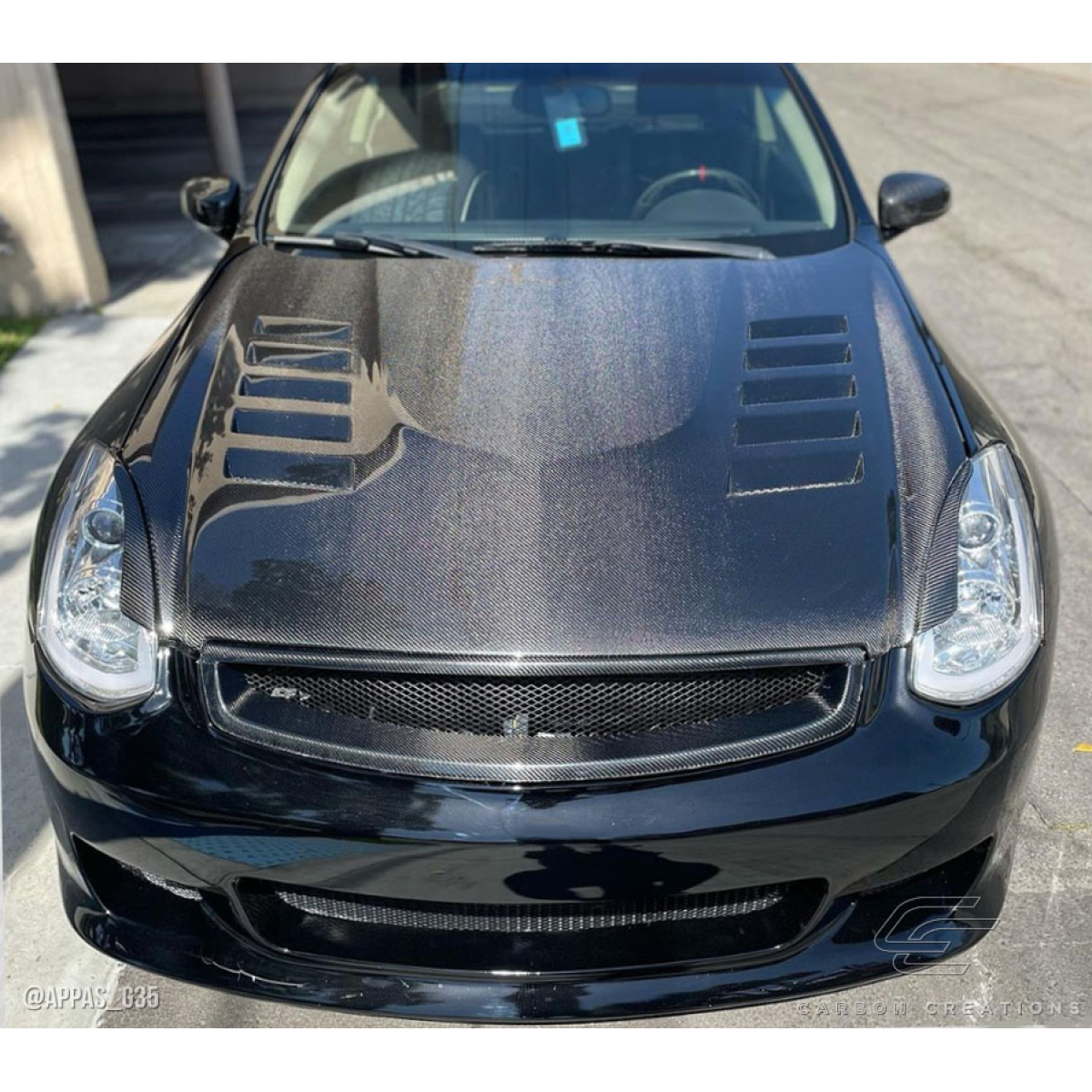 Modify your Infiniti G35 2003 with our Exterior/Hoods - Front view of the carbon fiber hood