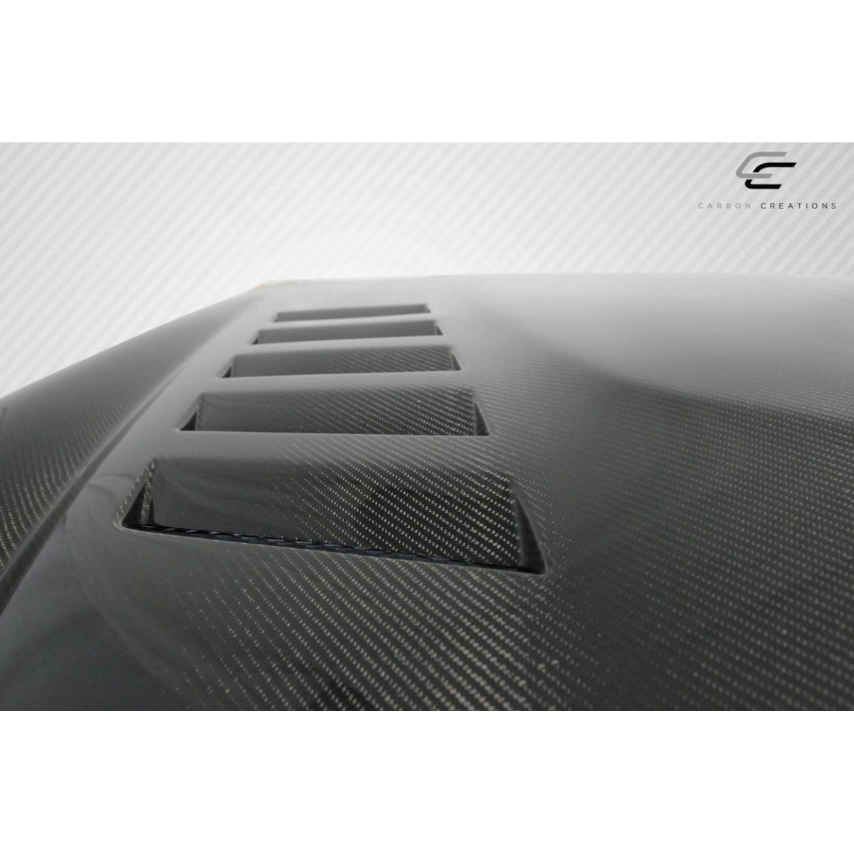 Modify your Infiniti G35 2003 with our Exterior/Hoods - Top view at a slight angle showcasing vents