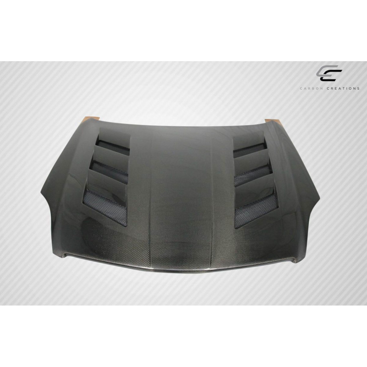 Modify your Infiniti G35 2003 with our Exterior/Hoods - Viewed from the front at a slight angle