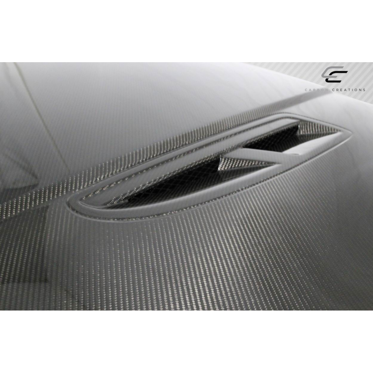 Modify your Volkswagen Golf 2015 with our Exterior/Hoods - Slightly angled view of a carbon fiber hood