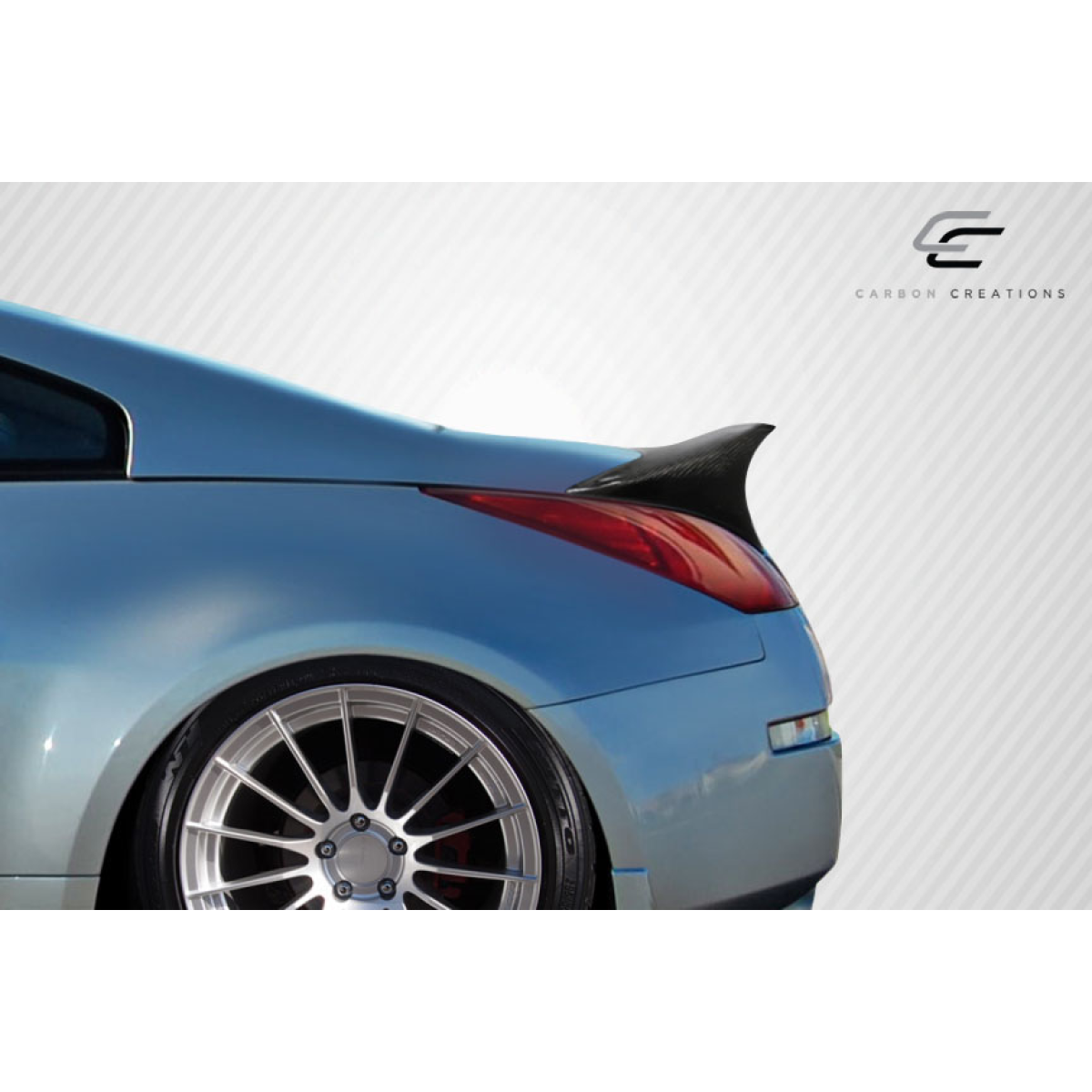 Modify your Nissan 350Z 2003 with our Exterior/Wings - Image shows rear angle of Nissan 350Z