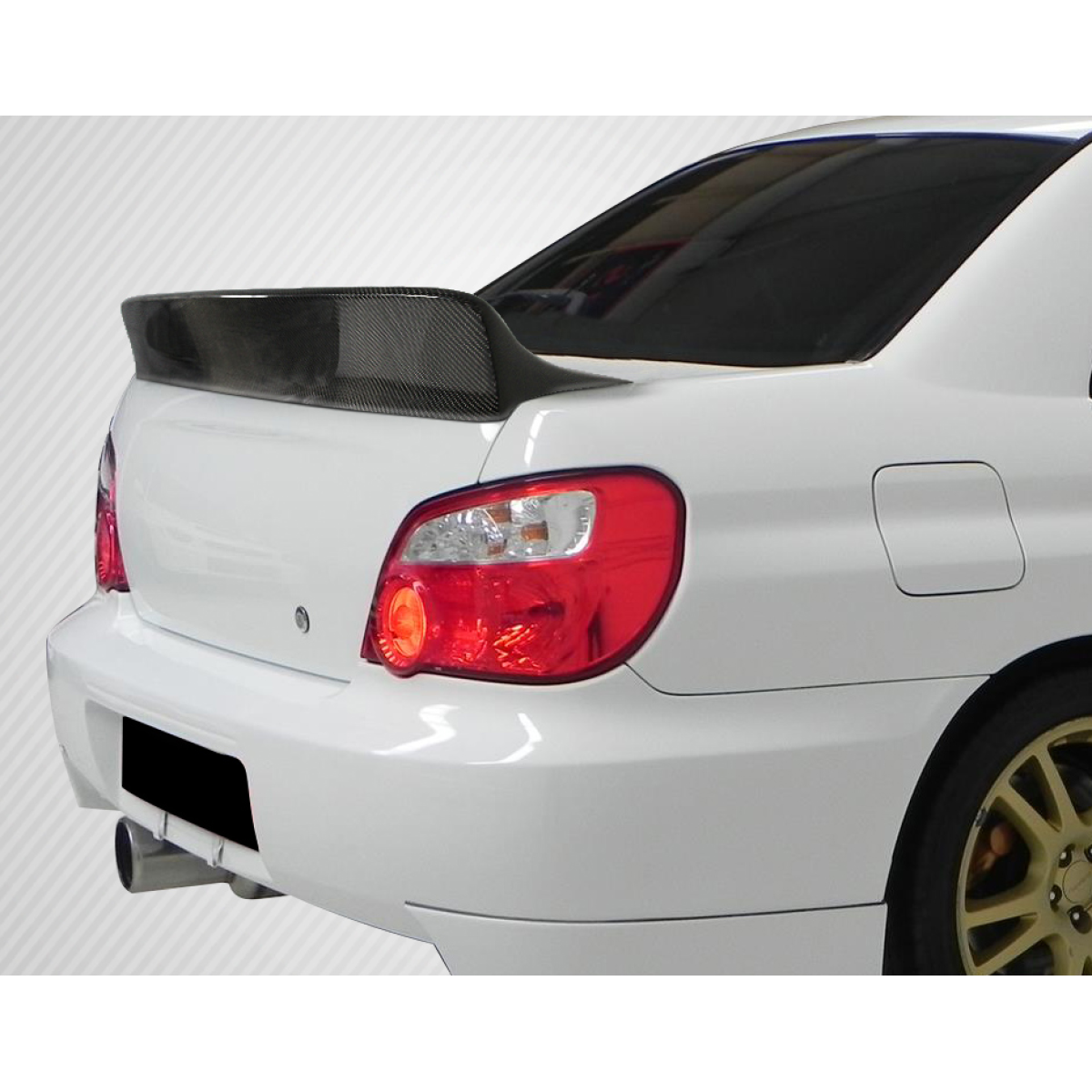 Modify your Subaru Impreza 2002 with our Exterior/Wings - Rear angle view showing carbon fiber rear wing